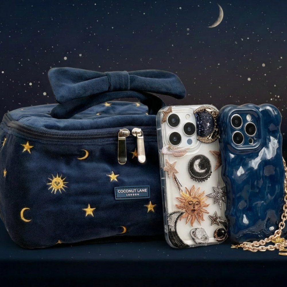 Celestial-themed Coconut Lane travel vanity case with star and moon design, shown alongside patterned phone cases.