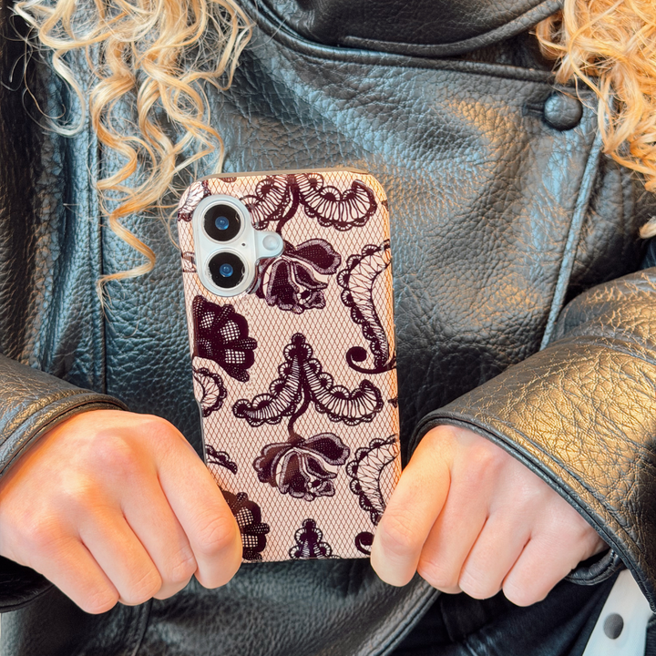 Girl in black leather jacket holding the black lace tough phone case