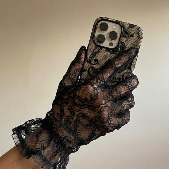 Girl with lace glove on holding the Black Lace Phone Case Tough Magsafe