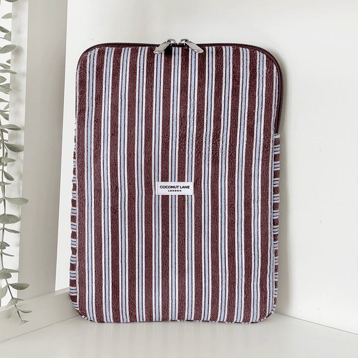 Brown, white and blue striped iPad Sleeve with silver zip and Coconut Lane logo badge.