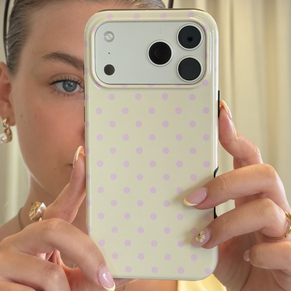 Girl taking mirror selfie with Butter Blush Phone Case