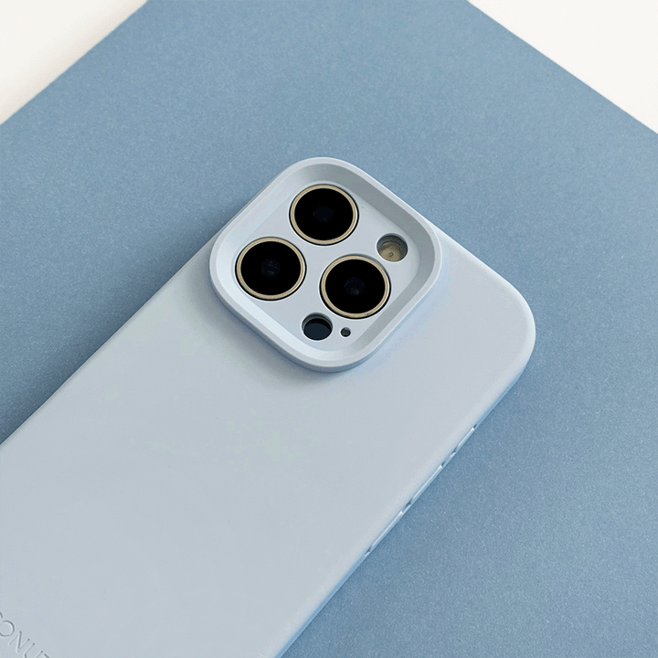 Blue Phone Case with 'Coconut Lane' branding on a pink background.