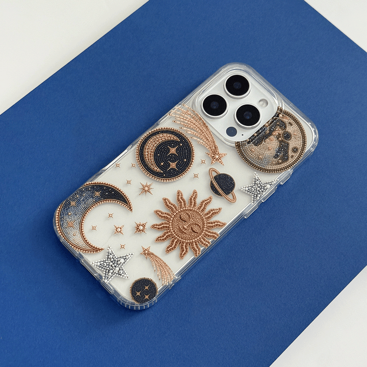 Clear Phone Case with celestial illustrations; stars, space, moon and sun.