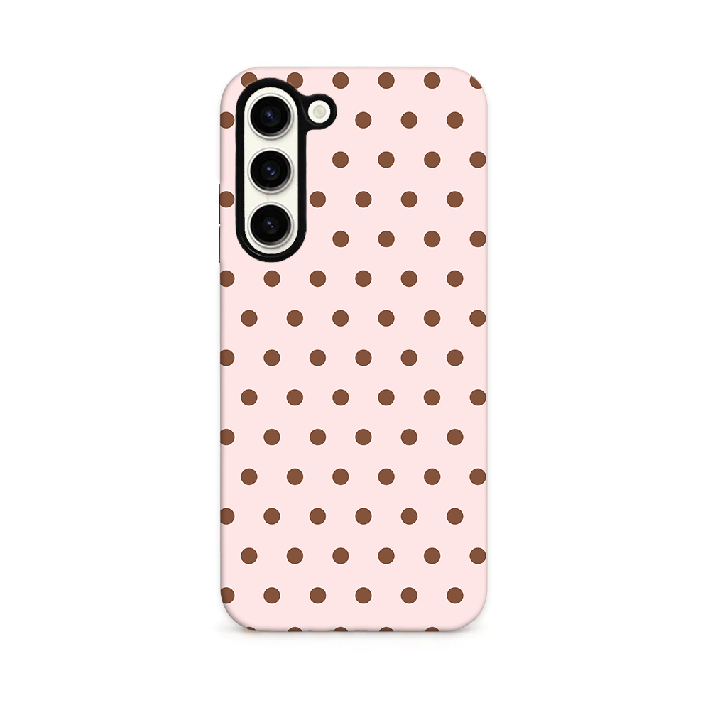 Baby pink phone case with chcolate brown polka dots.