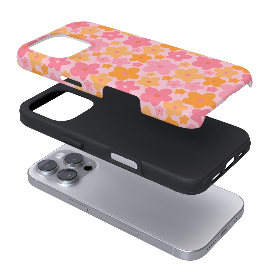 Expanded view of a pink phone case with floral pattern on a white background