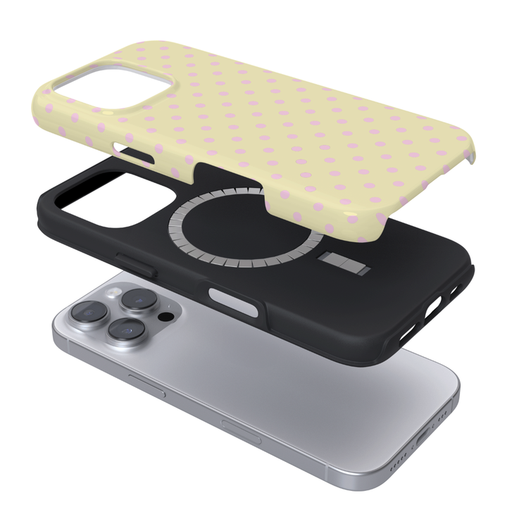 Pale yellow Phone Case mockup with baby pink polka dots. Showing the MagSafe element. 