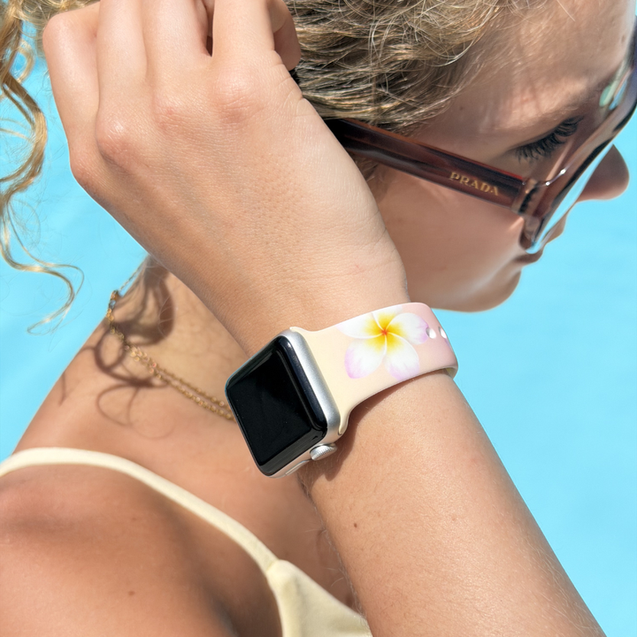 Girl with Aloha Bloom Watch Strap on wrist in pool / summer / floral